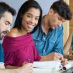 Happy students at library